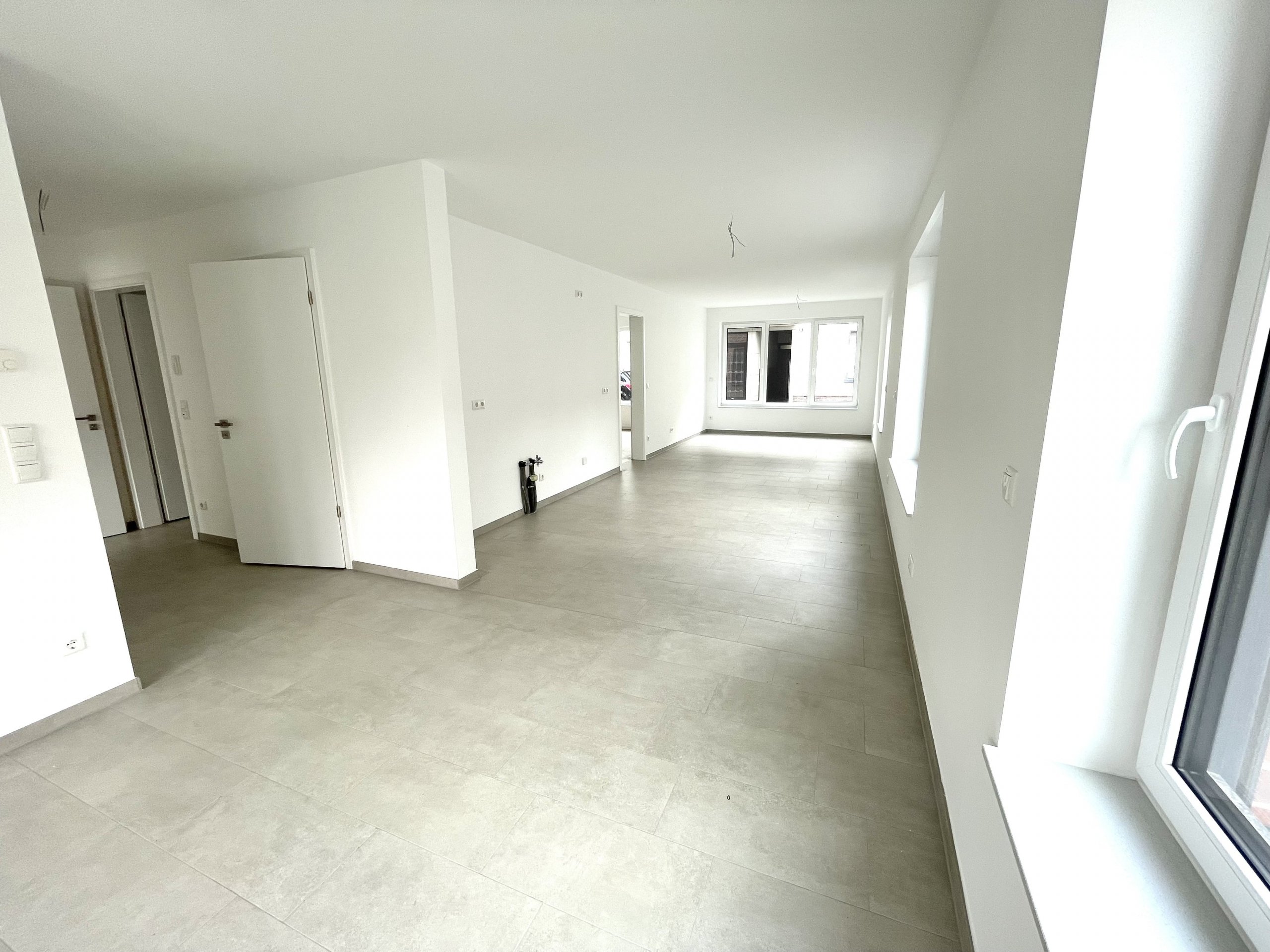 Borken-City: Modernes Mehrfamilienhaus: 6 x 3-Zi.-Wohnungen mit PKW-Stellplätzen und Aufzug!